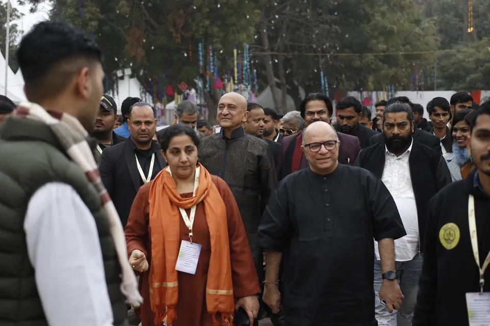 Visitors and guests walk through the festival grounds