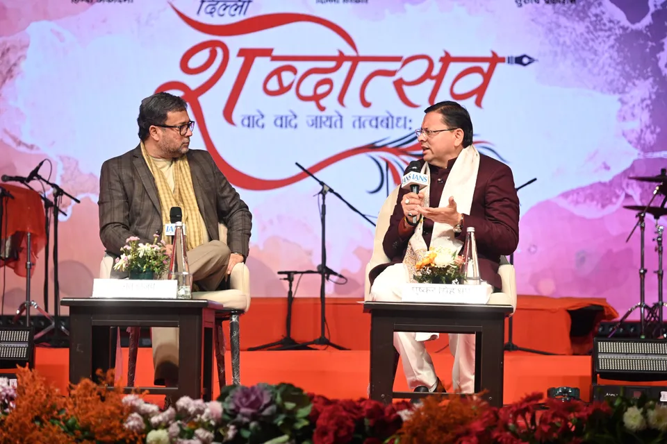 Two speakers in conversation on the main stage