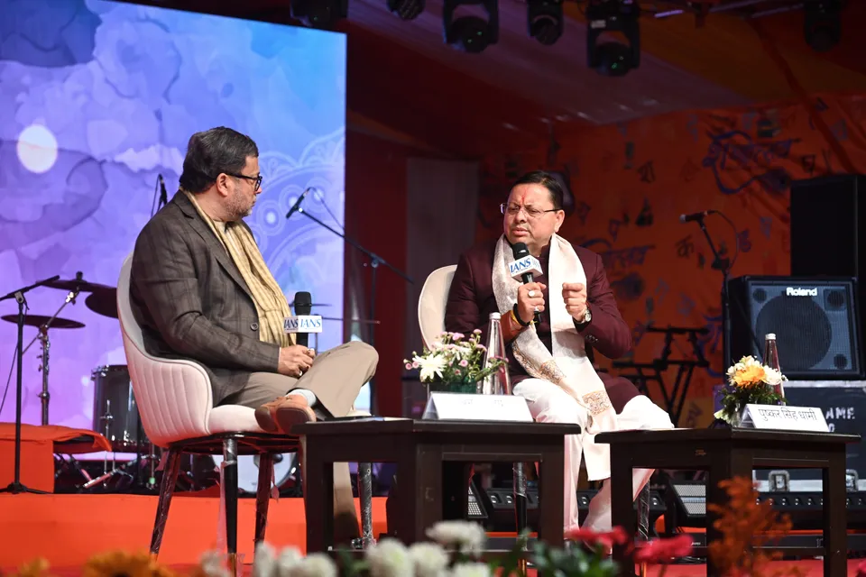 Two speakers in conversation on the main stage